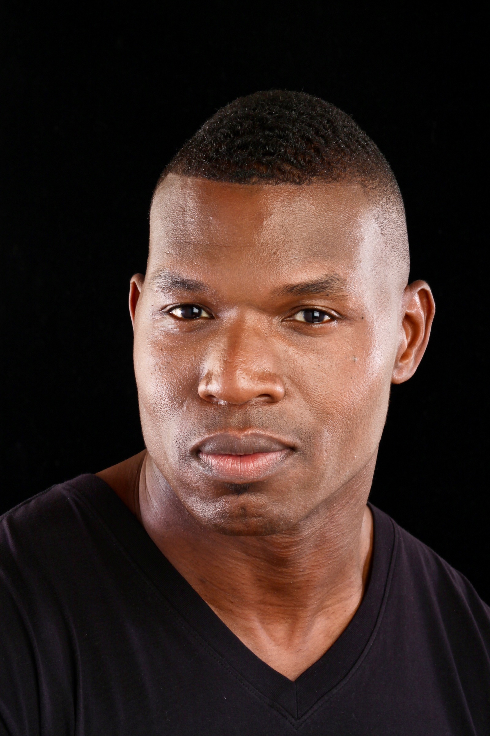 Lawrence Beamen studio headshot on a black backdrop